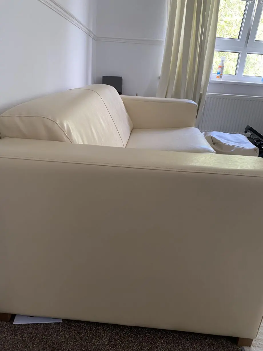 Faux cream leather sofa + beanbag style footstool Like new condition