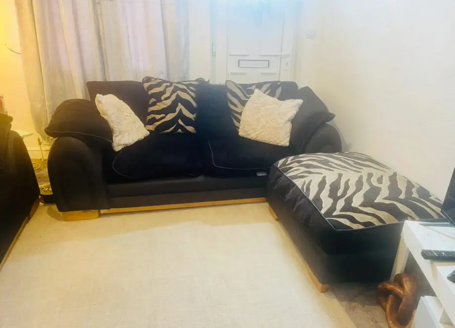 Comfy Black & Leopard Print Sofa — Available Now!