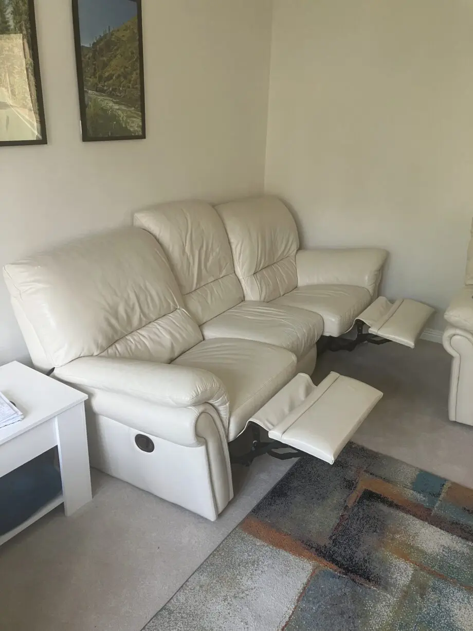 Cream faux leather 3 seater recliner sofa with 2 matching recliner armchairs