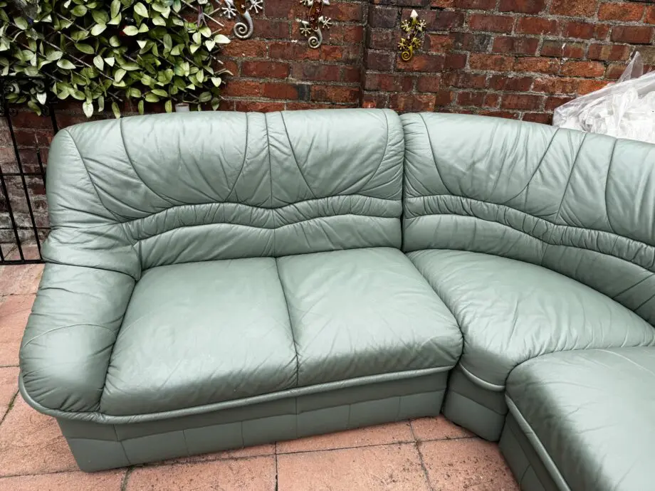 Green leather corner sofa