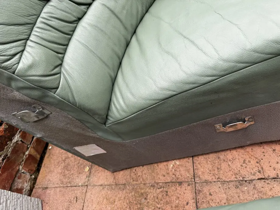 Green leather corner sofa