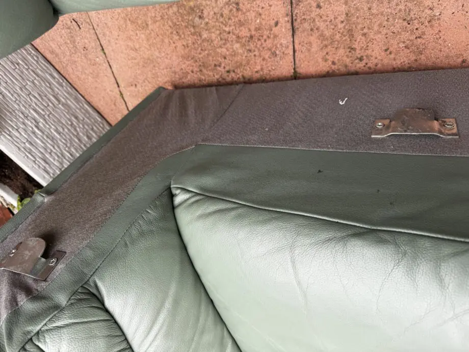 Green leather corner sofa