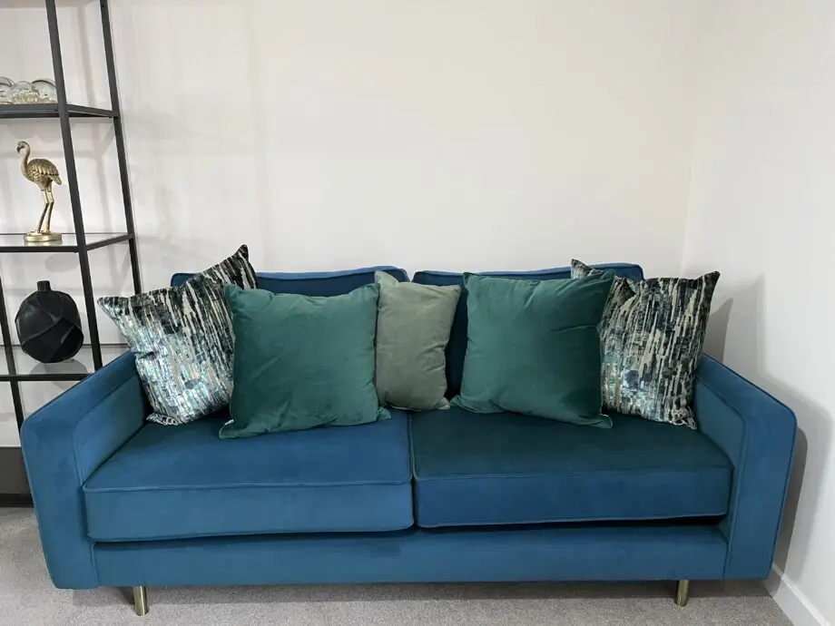 3 seater teal sofa