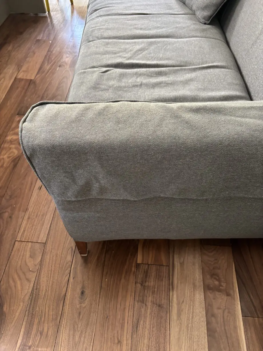 Dwell grey sofa with plumbs slip cover