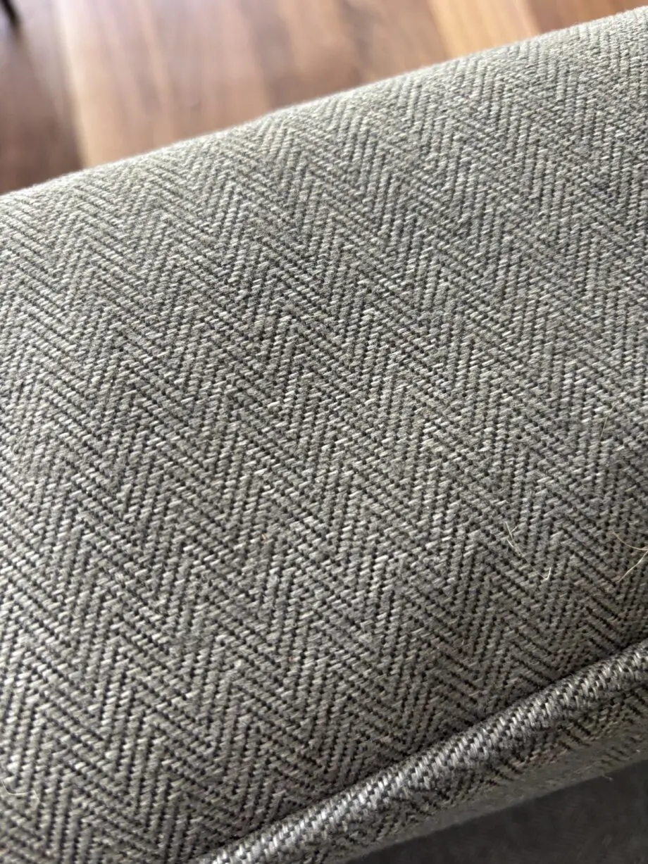 Dwell grey sofa with plumbs slip cover