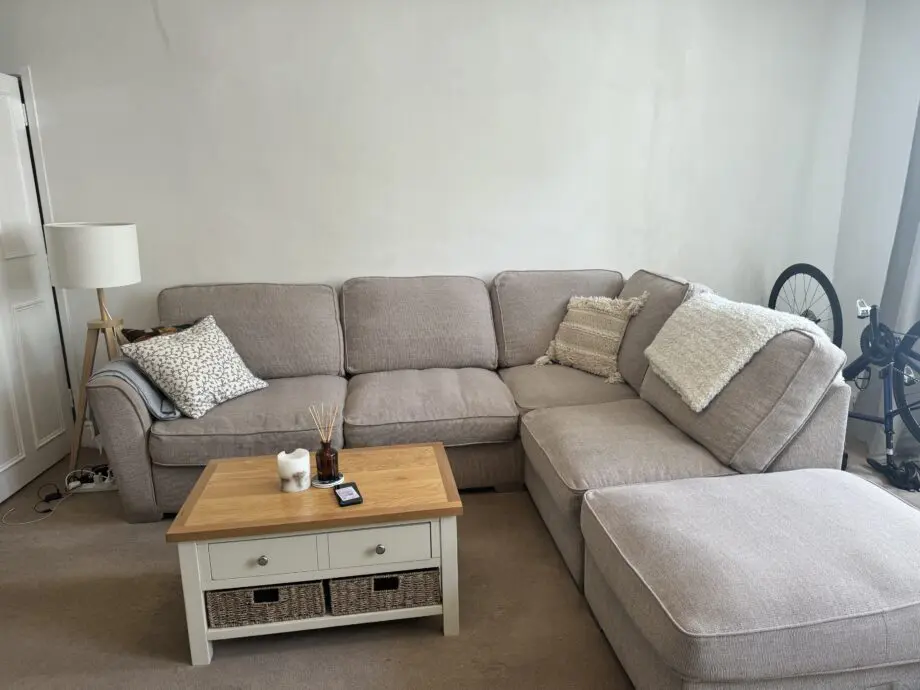 Beige fabric corner sofa