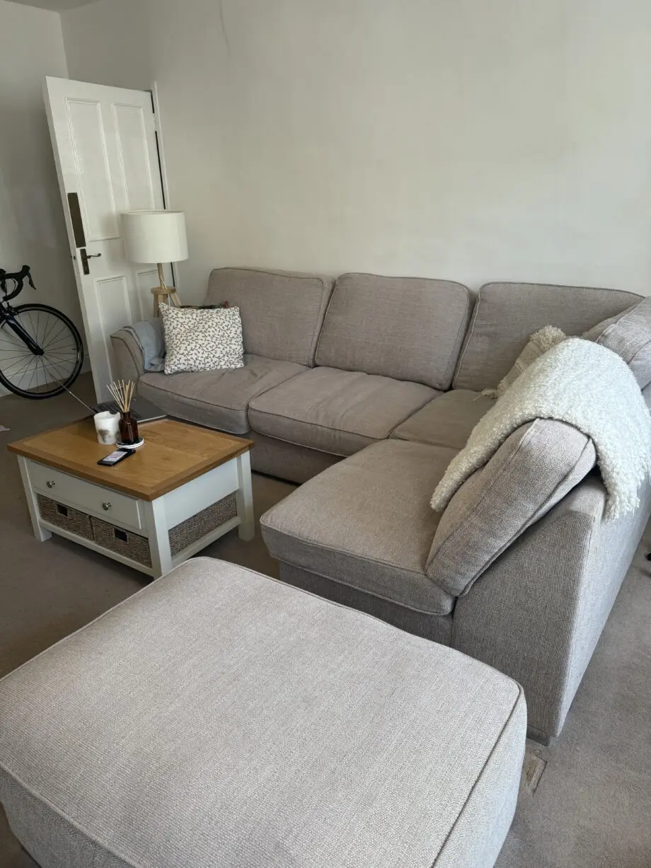 Beige fabric corner sofa