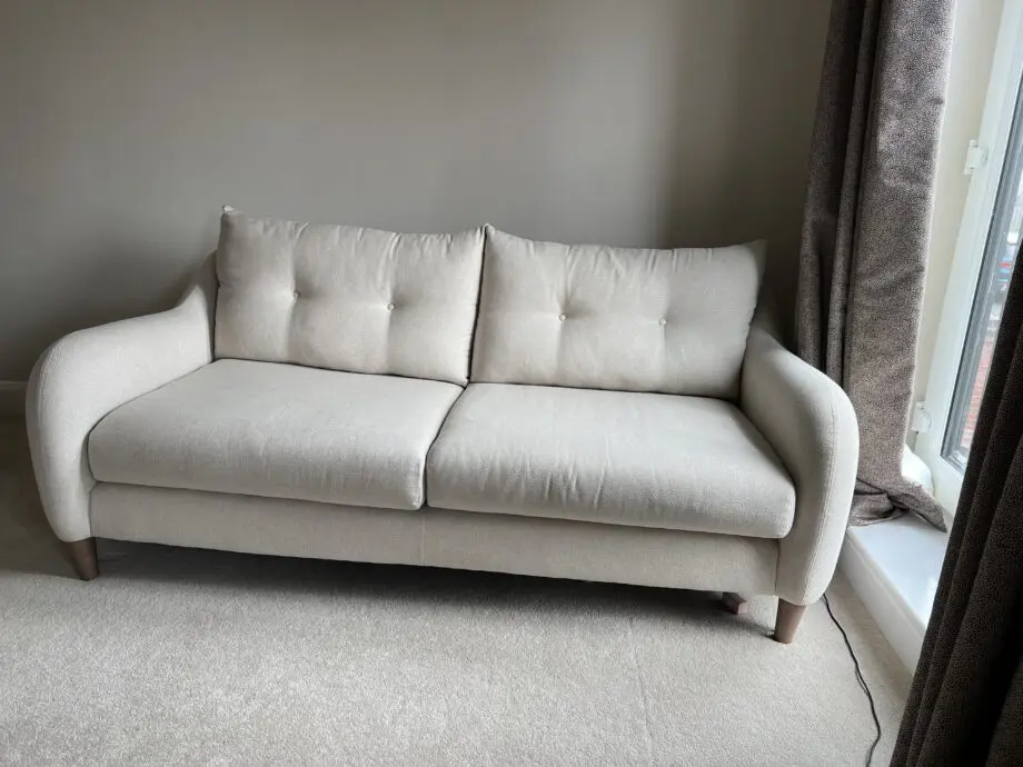 3 seater cream sofa