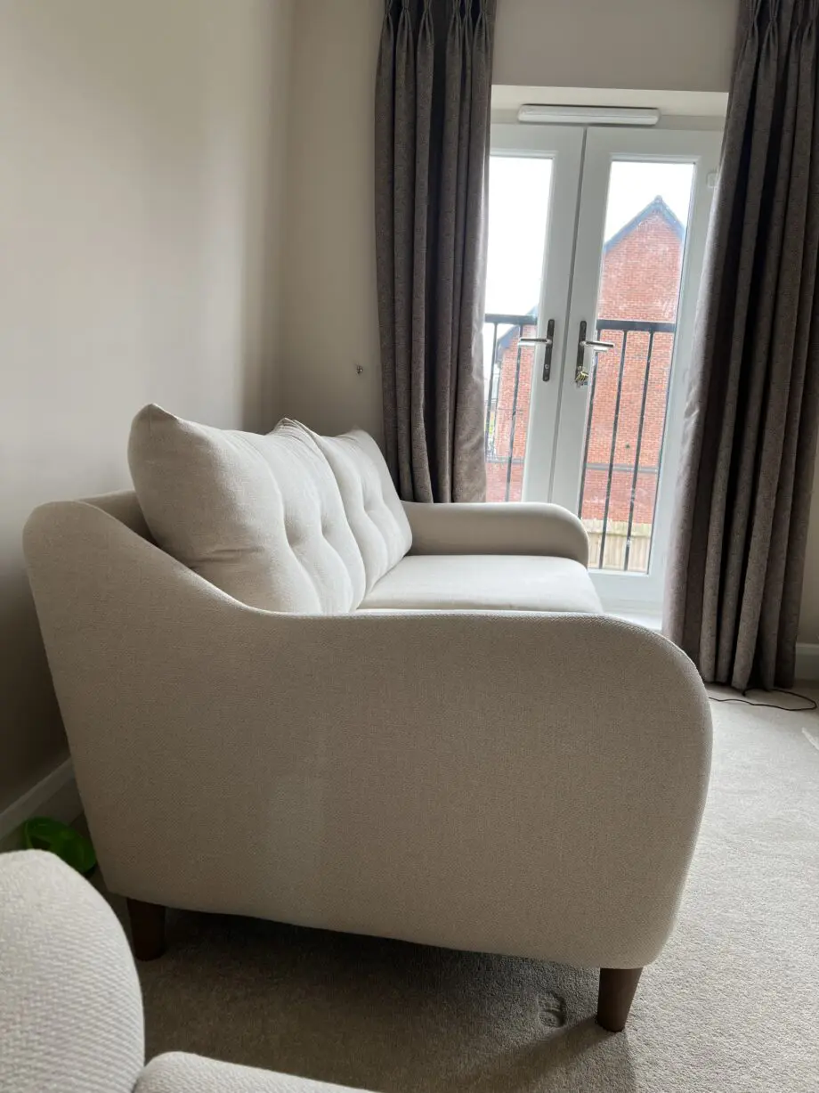 3 seater cream sofa