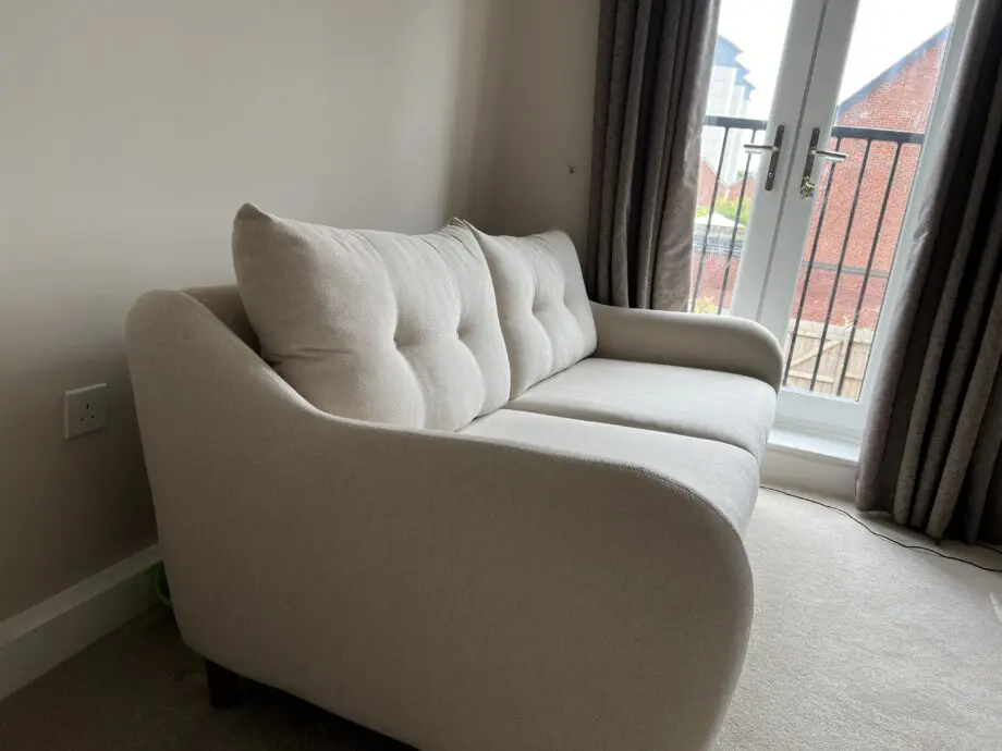 3 seater cream sofa