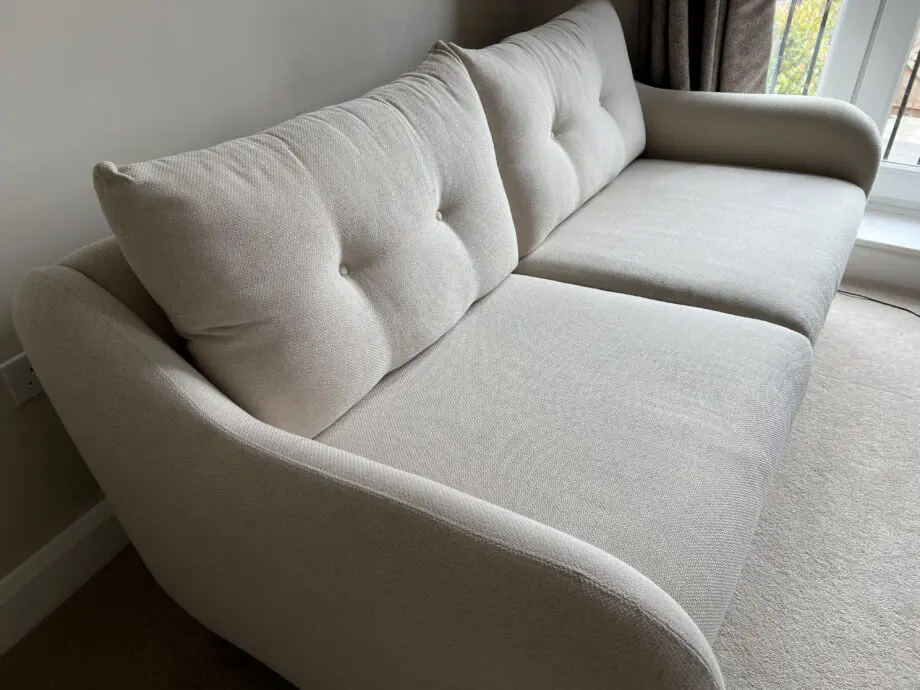 3 seater cream sofa