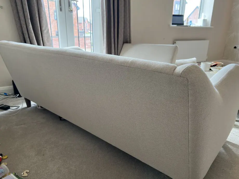 3 seater cream sofa