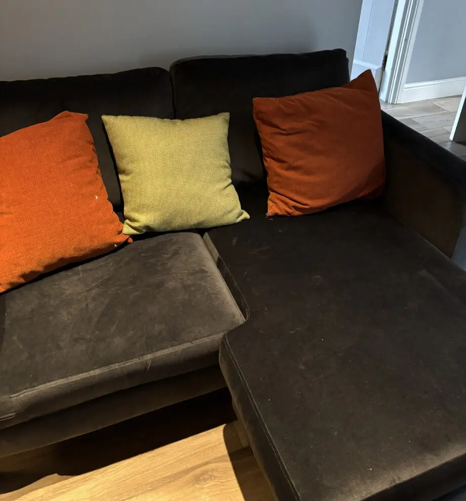 DFS dark grey 2 seater sofa with chaise and foot stall