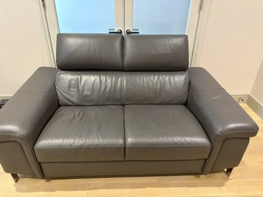 Grey leather 2 seater sofa