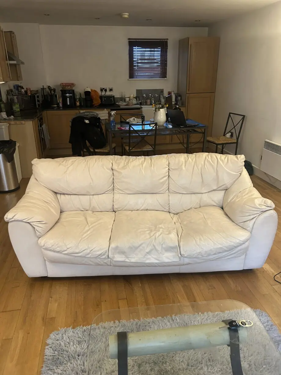 2 cream leather 3 seater sofa