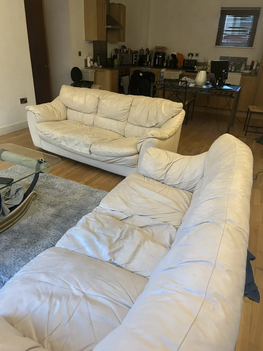 2 cream leather 3 seater sofa