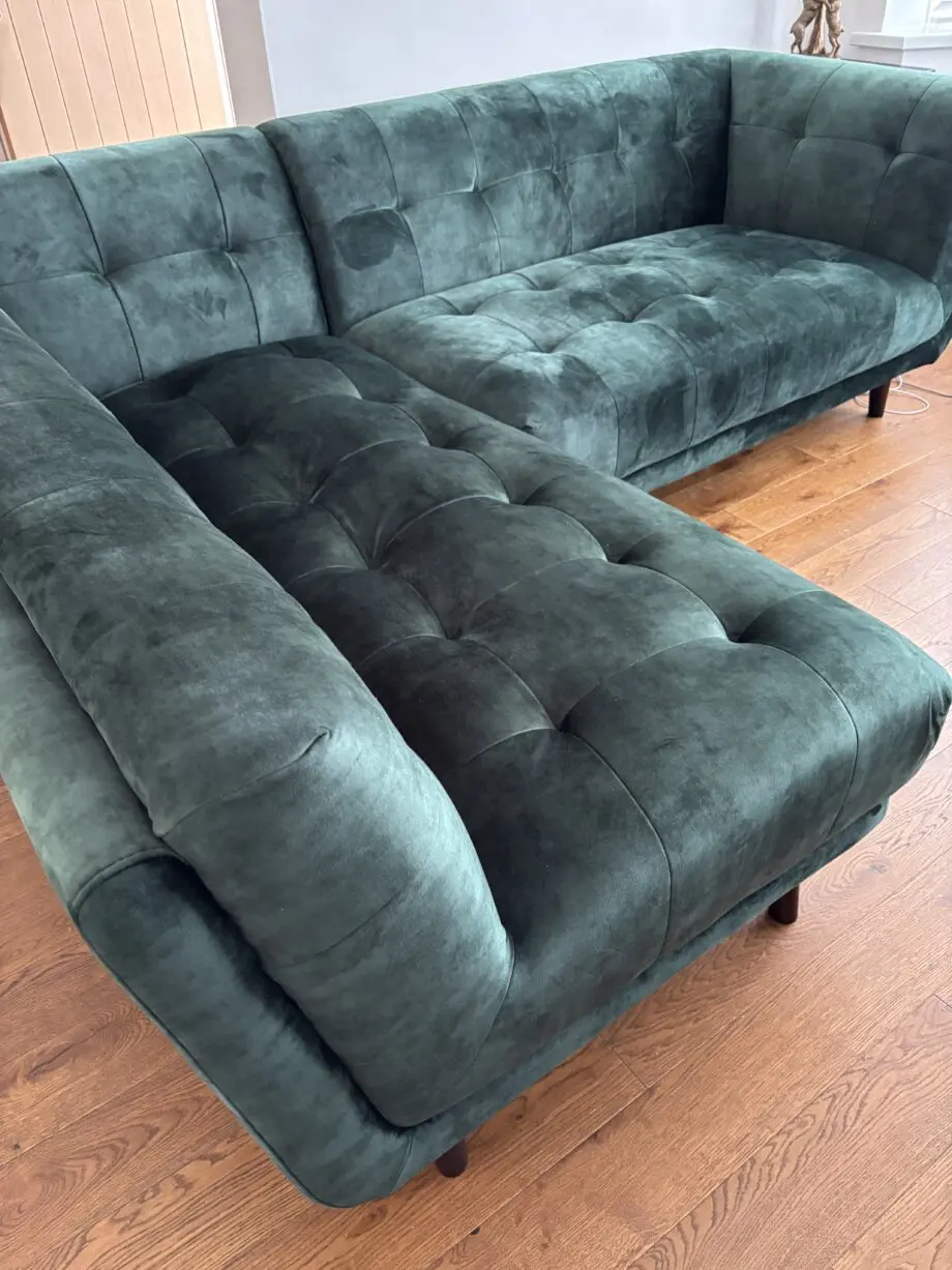 Bottle green corner sofa with footstool
