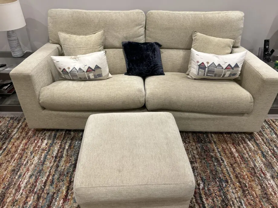 Beige 3 seater and 2 seater sofa with footstool