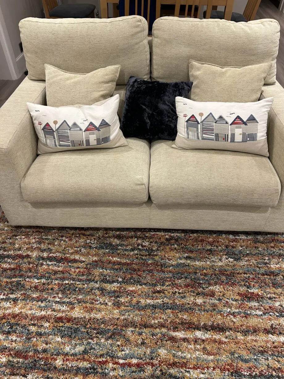 Beige 3 seater and 2 seater sofa with footstool