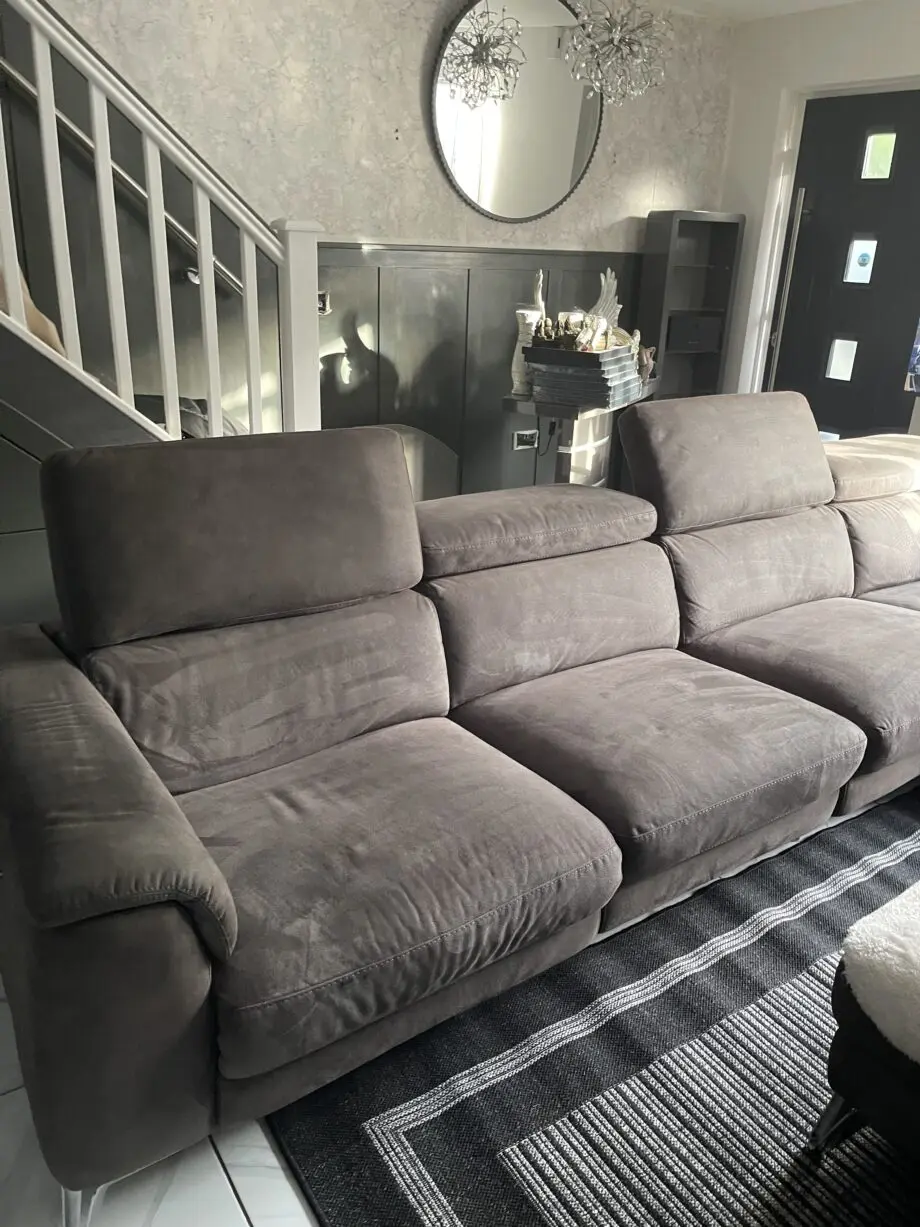 Grey corner sofa left hand when sitting on sofa
