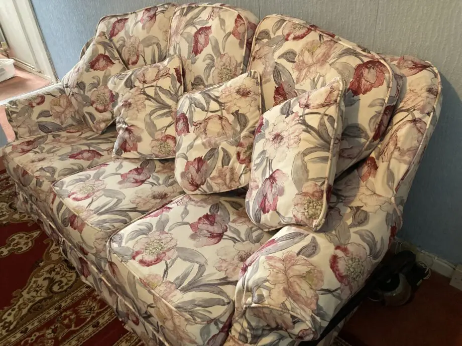 Brown sofa with custom covers and pillows
