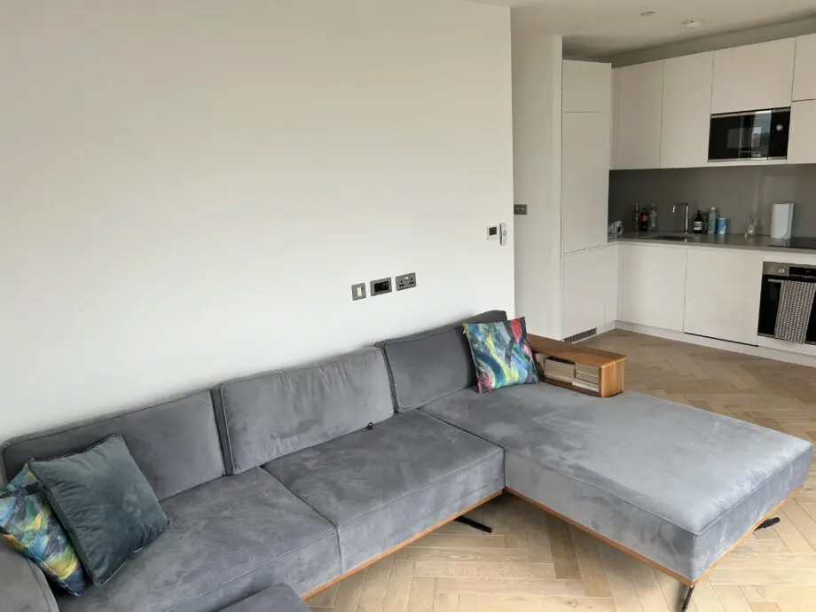 Corner sofa, with bookshelf in arm