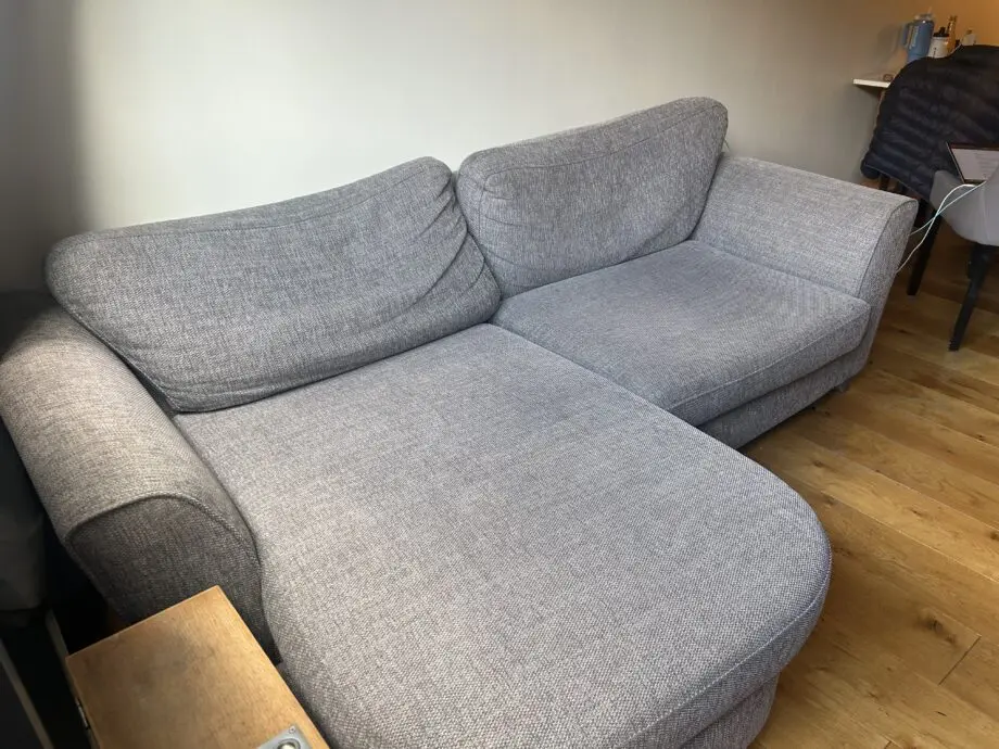 Grey 2-seater sofa with chaise