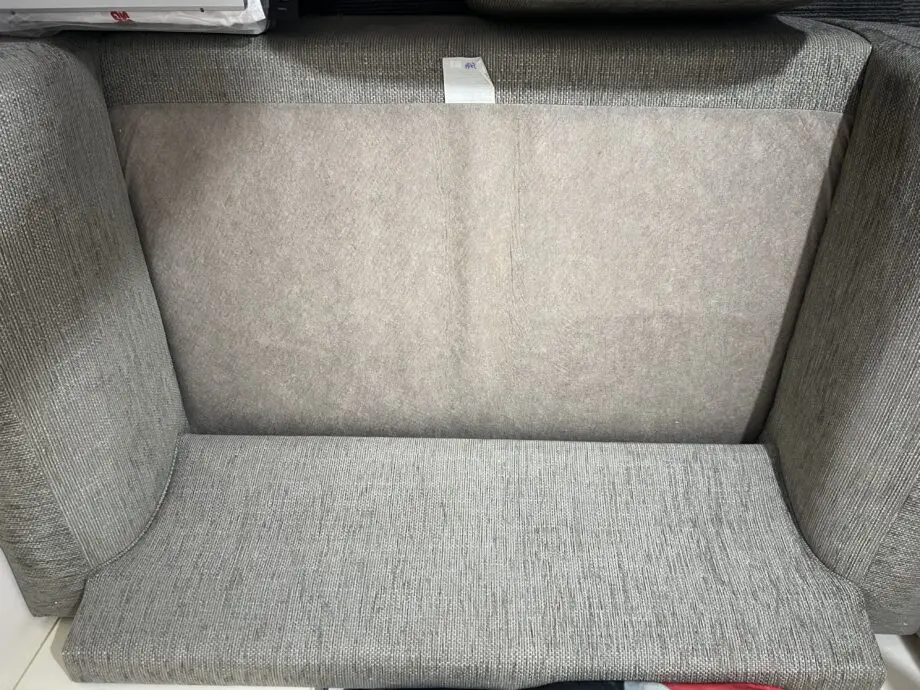 Grey two seater sofa