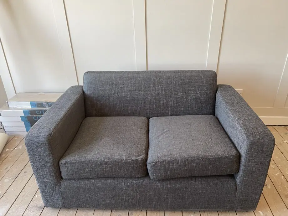 Grey charcoal two seater sofa brand new