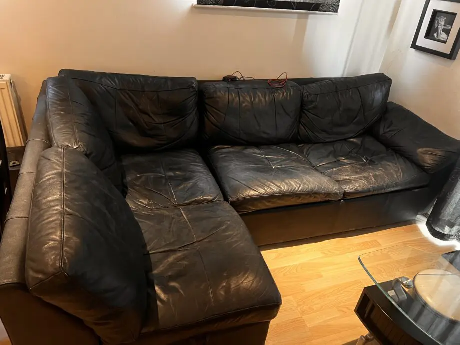 Real leather black corner sofa bed with storage