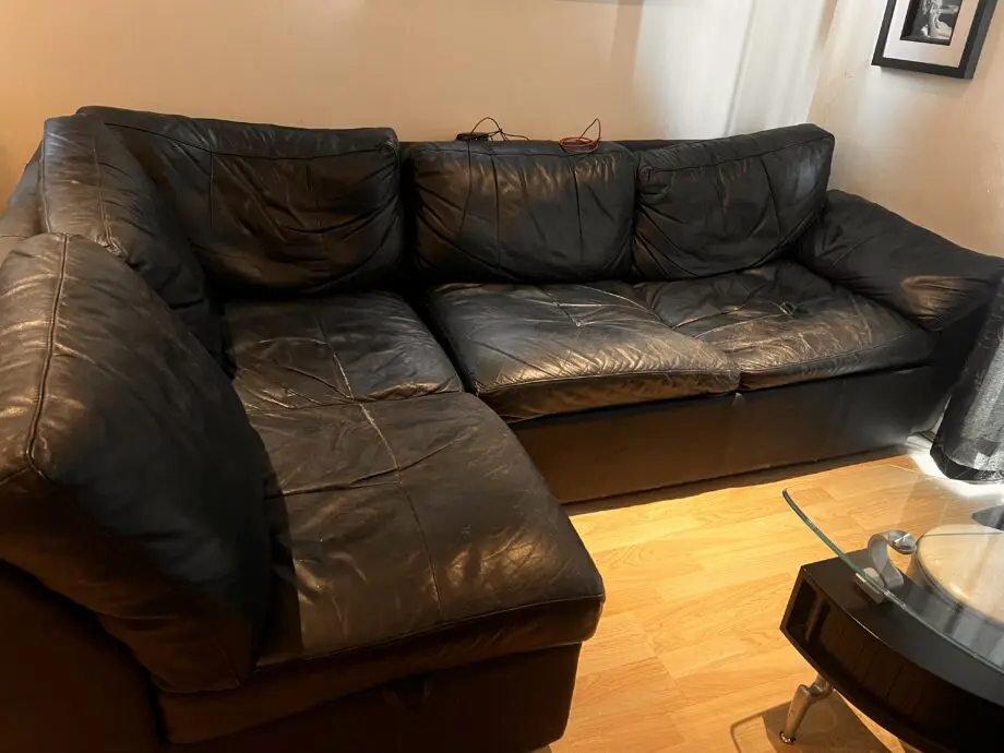Real leather black corner sofa bed with storage