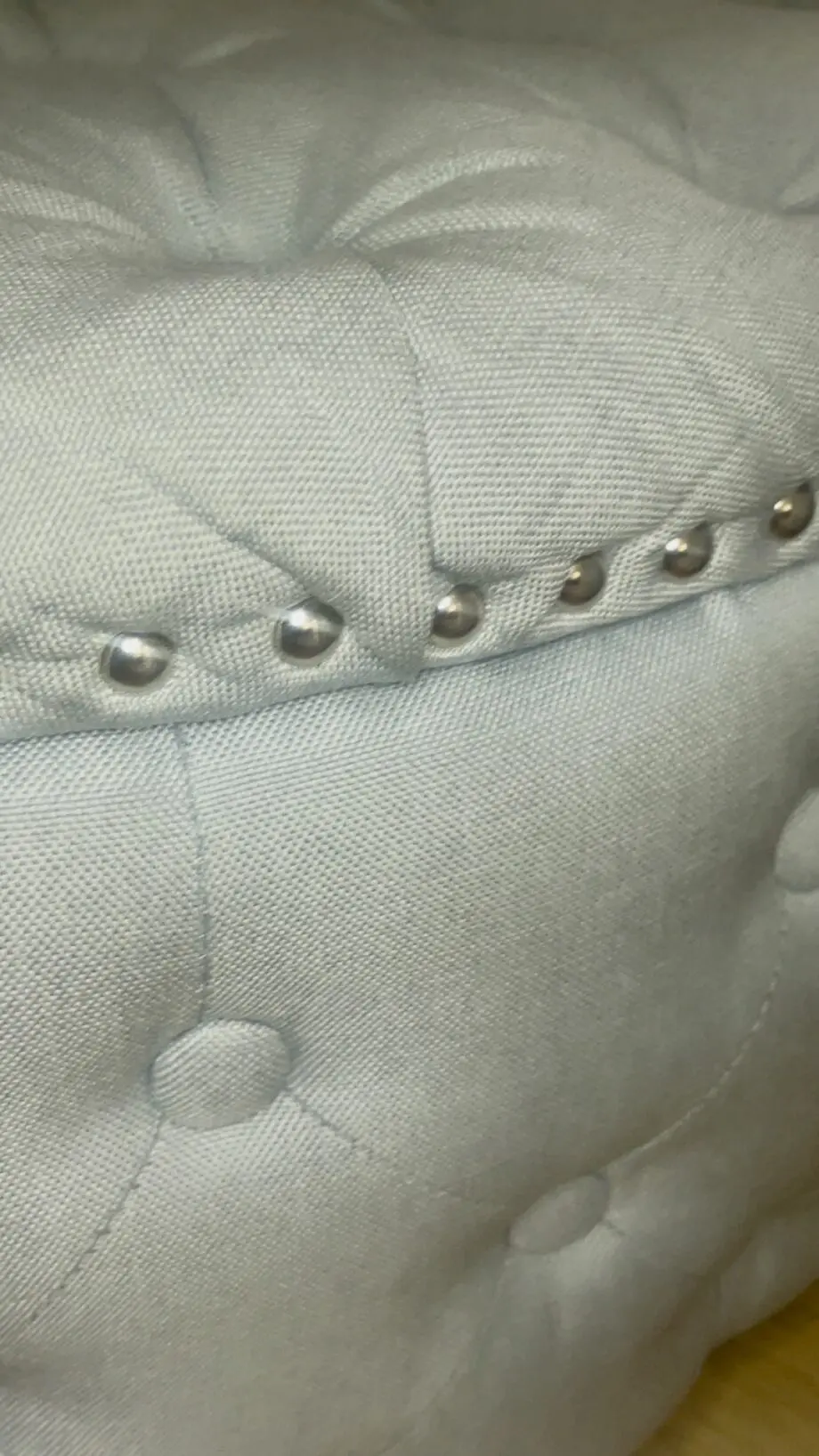 3 seater Grey Linen Left Facing Chesterfield Corner Chaise and a Grey White Round Linen Deep Buttoned Ottoman with Studded Edge