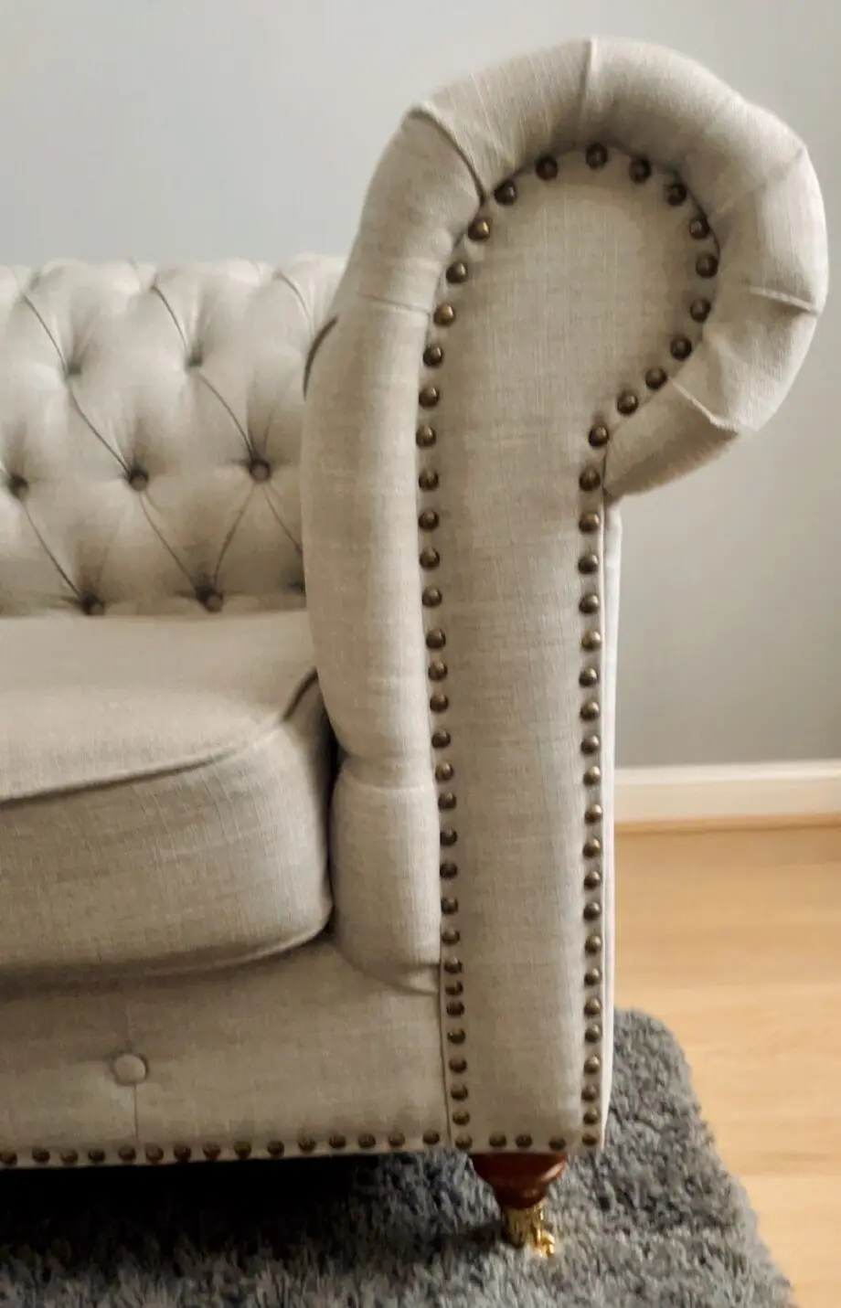 3 seater Grey Linen Left Facing Chesterfield Corner Chaise and a Grey White Round Linen Deep Buttoned Ottoman with Studded Edge