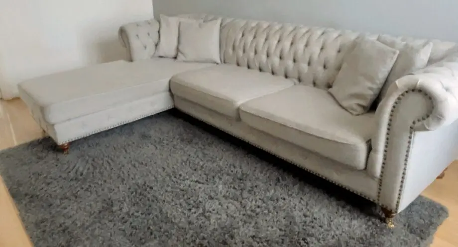3 seater Grey Linen Left Facing Chesterfield Corner Chaise and a Grey White Round Linen Deep Buttoned Ottoman with Studded Edge