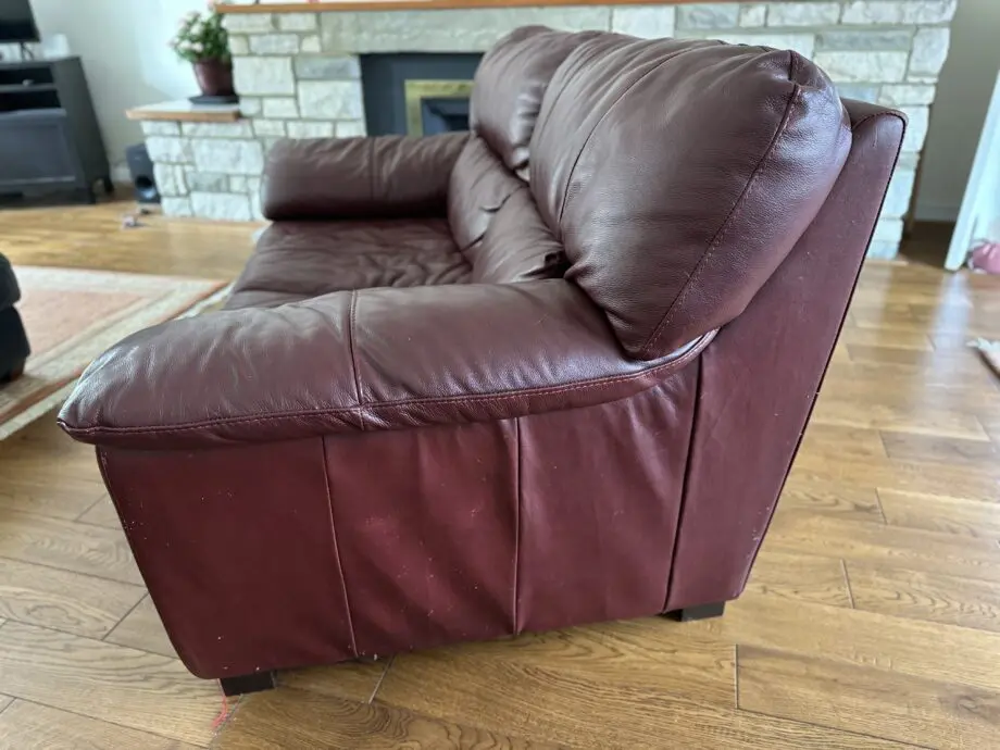 Leather 2 seater sofa, some wear.