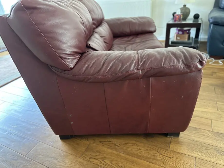 Leather 2 seater sofa, some wear.