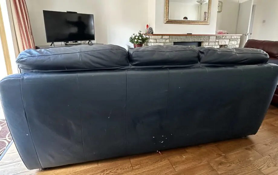 Leather 3 seater sofa and pouffe