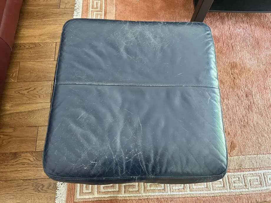 Leather 3 seater sofa and pouffe