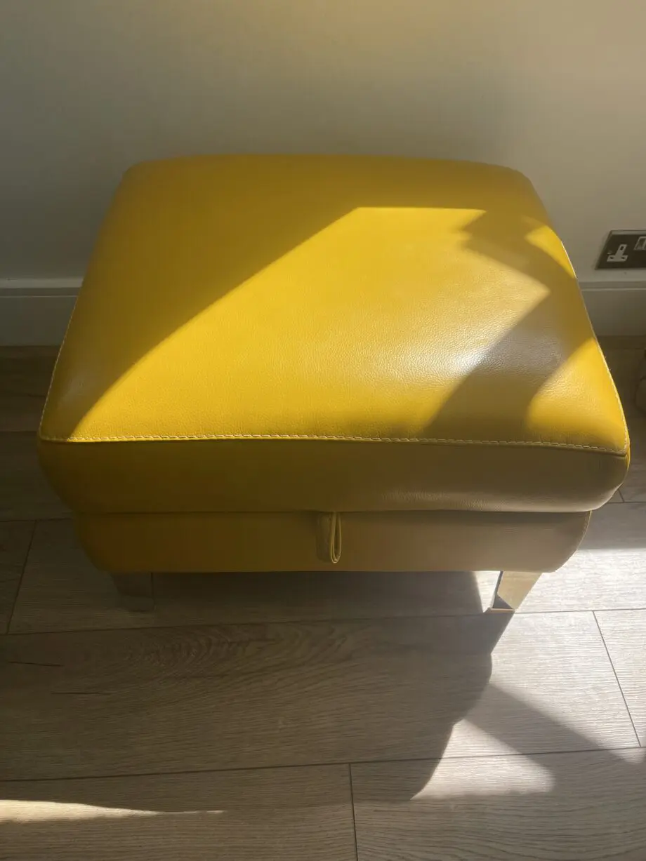 Furniture village 2 seater power recliner in NC leather and opening footstool in