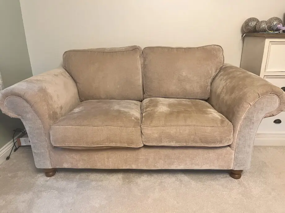 Beige 2 seater sofa