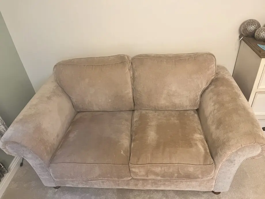 Beige 2 seater sofa