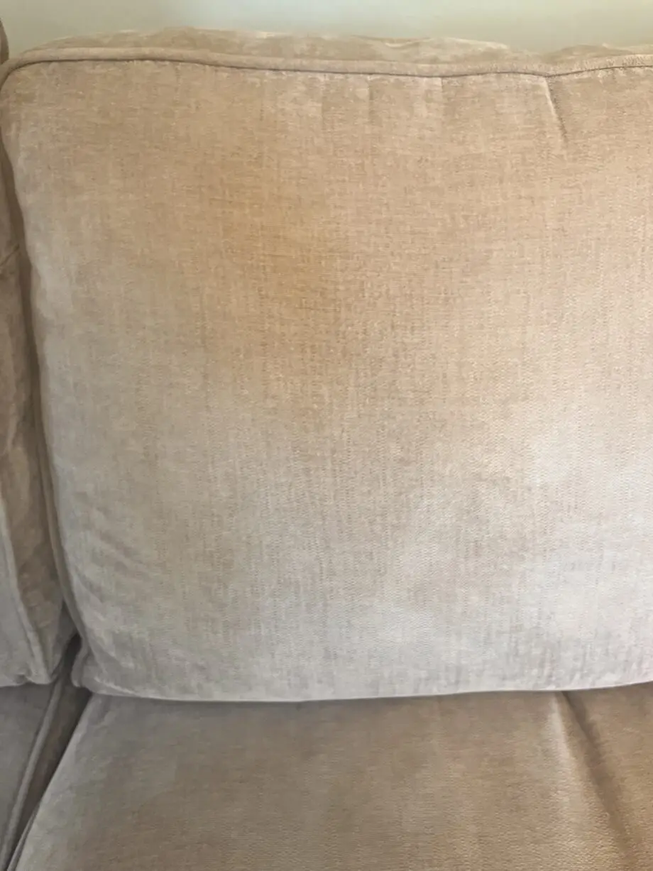 Beige 2 seater sofa