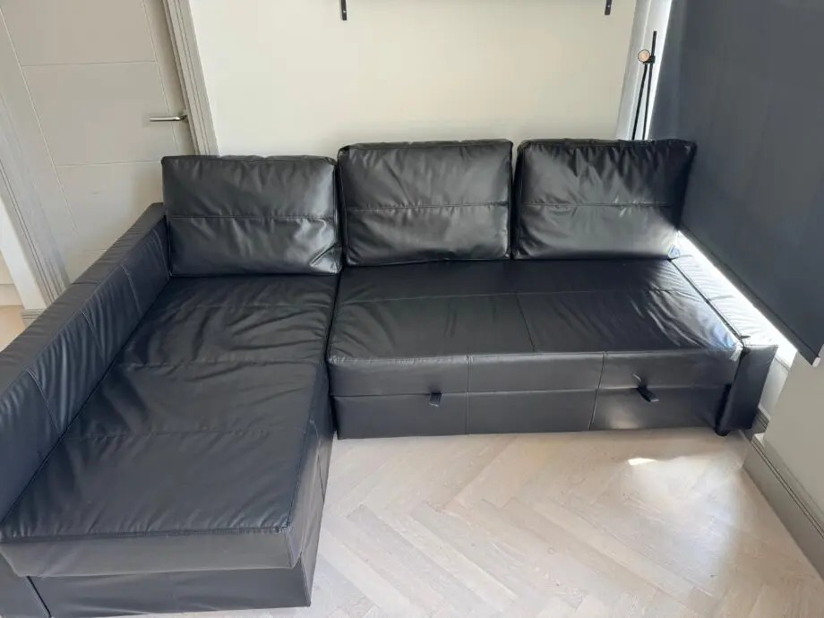 Black leather sofabed with storage