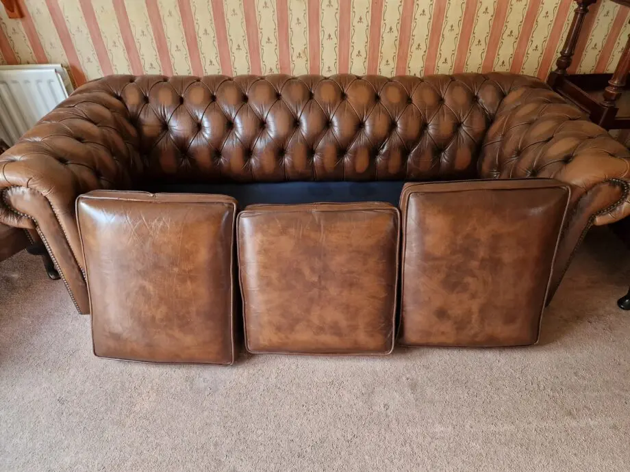 CHESTERFIELD SAXON LEATHER SUITE (sofa, 2 armchairs and footstool)