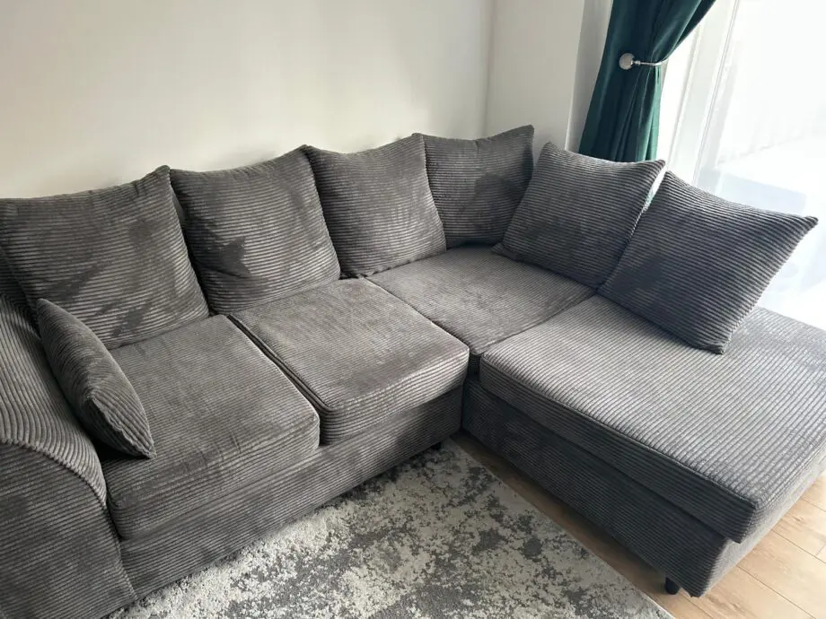 Grey L shape cord sofa