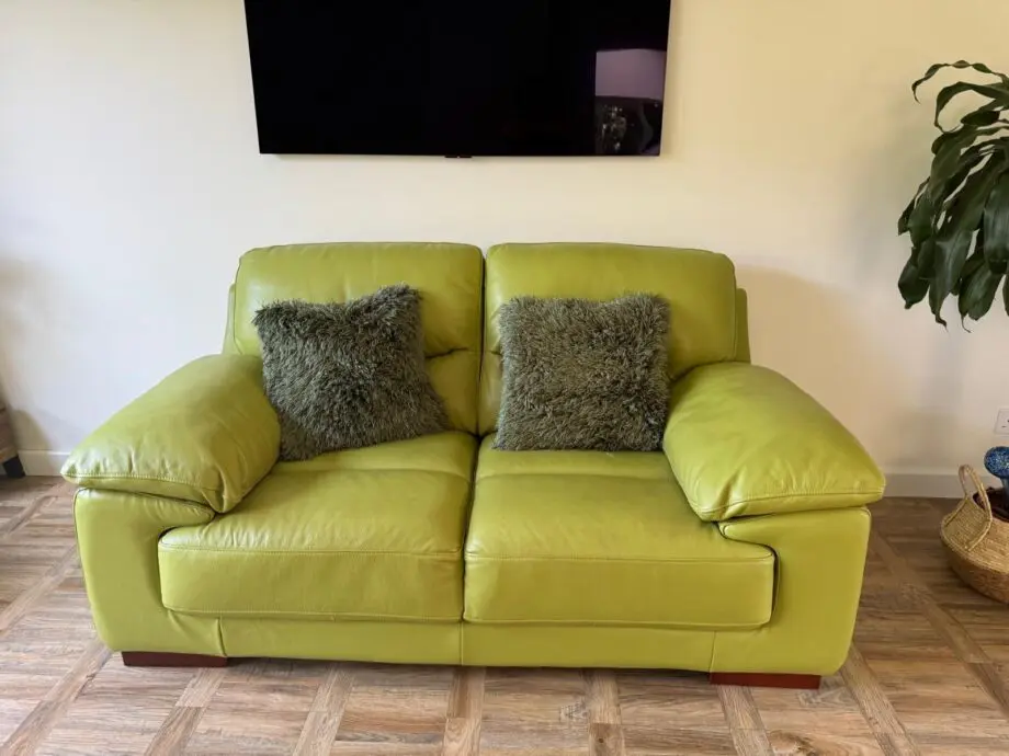 DFS Dazzle 2 seater sofa + storage pouffe green