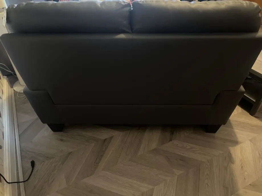2 seater grey faux leather sofa