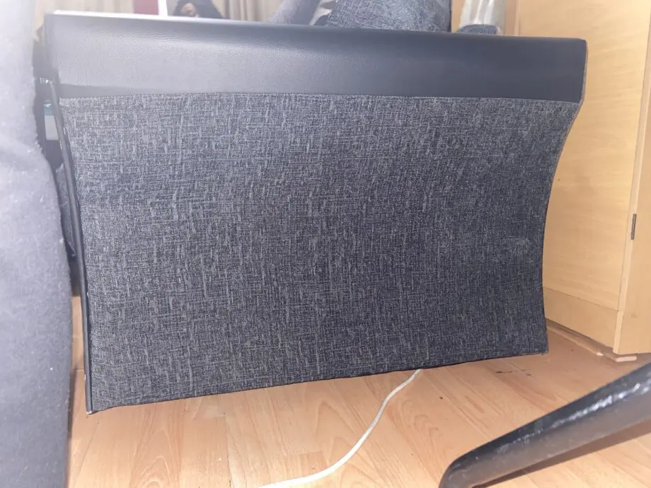 Unknown + black and charcoal cushion + two seated sofa