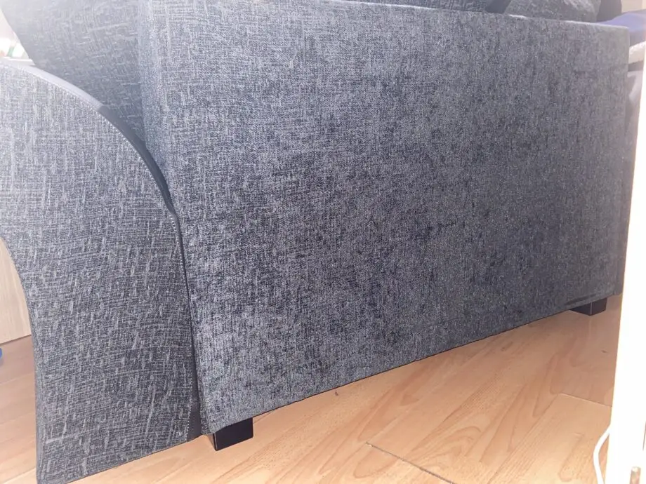 Unknown + black and charcoal cushion + two seated sofa