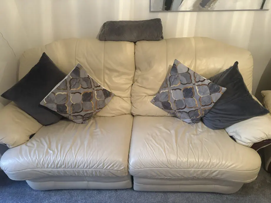 Cream leather chairs and sofa all reclining
